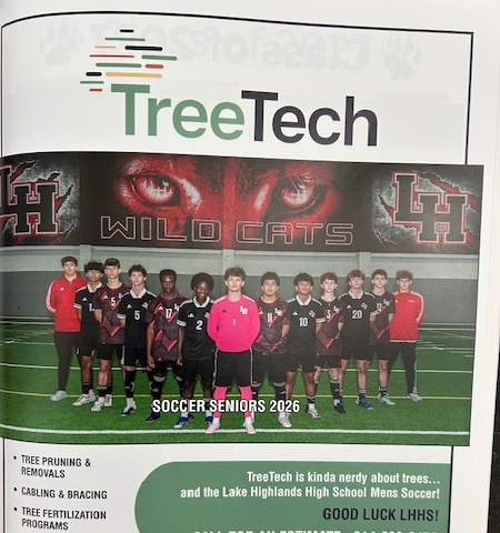 AM Dallas community section Wildcats soccer team posing together in uniform, likely during a local match or community event.