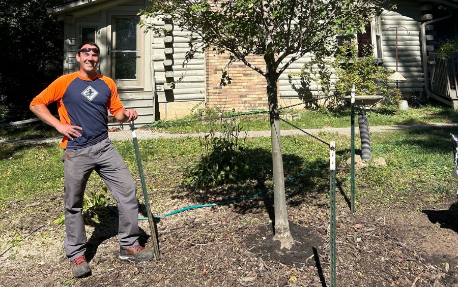 A member of the Arbor Masters team after planting a tree in Bixby, OK.