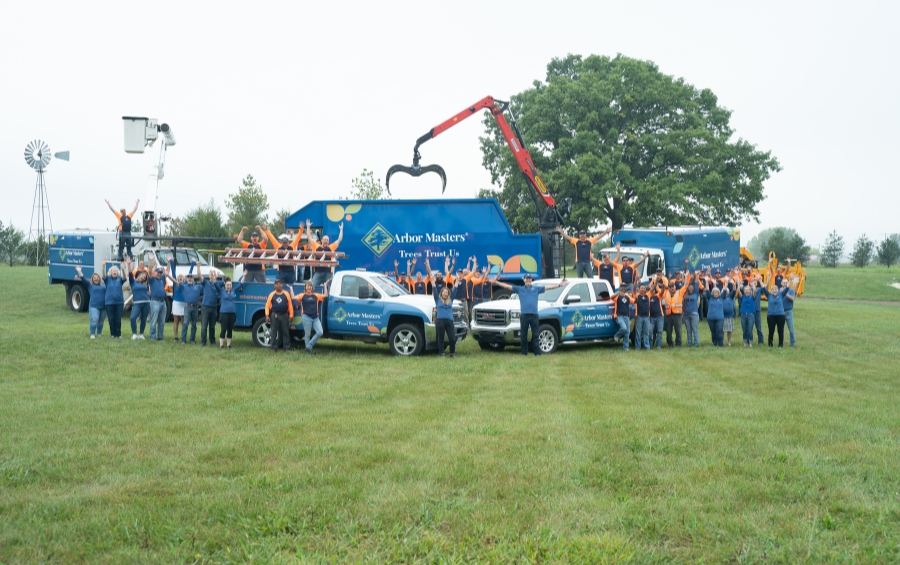 Arbor Masters tree service team with trucks and equipment ready to serve Central Midwest communities. 