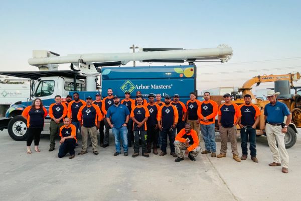 Tree crew for a team photo of Arbor Master in Oklahoma City, OK.