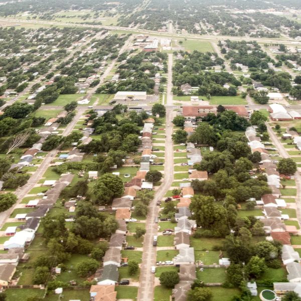 suburbs in Oklahoma with garden and trees on every property.